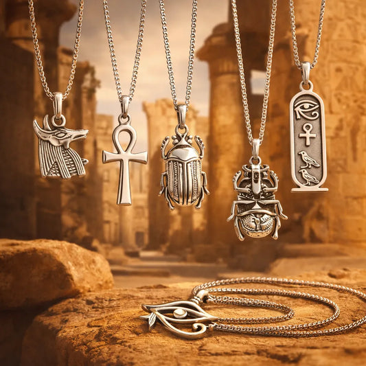 Ancient Egyptian jewelry meaning guide hero image featuring 925 sterling silver Egyptian symbol necklaces (Ankh, Anubis, Scarab, Eye of Horus, Cartouche)