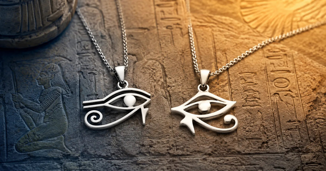 Sterling silver Eye of Ra and Eye of Horus necklaces on an ancient Egyptian stone background, showing the difference between the two eye symbols.